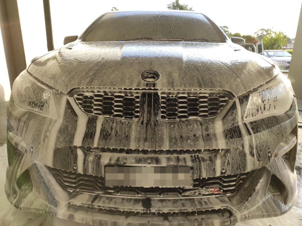 Foam on car to safely wash it